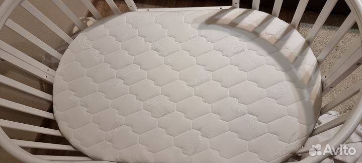 Детская кроватка с продольным маятником