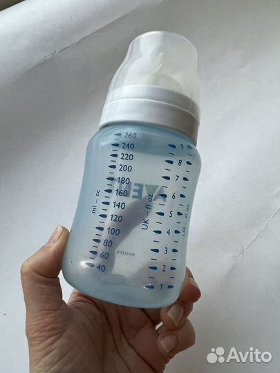 Молокоотсос ручной с подарком бутылочкой