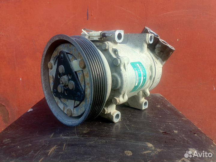 Компрессор кондиционера 7700273801