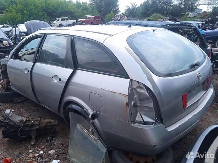 Стекло заднее левое Nissan primera P12 универсал