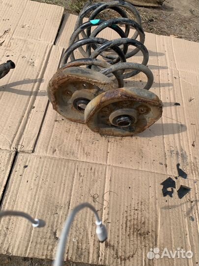 Пружины передние с чашками mazda familia bj