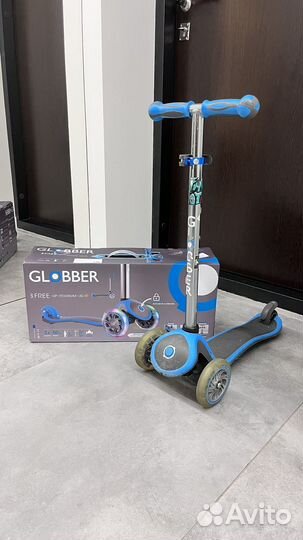 Трехколесный растущий самокат globber lights Neon