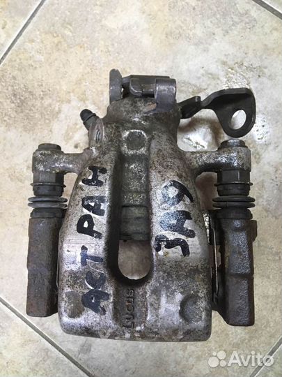 Суппорт тормозной левый. Опель астра H