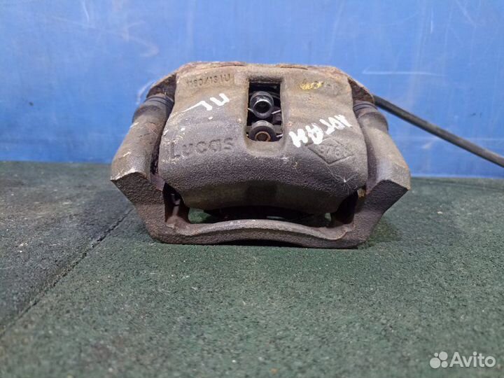Суппорт тормозной передний левый Renault Logan 1
