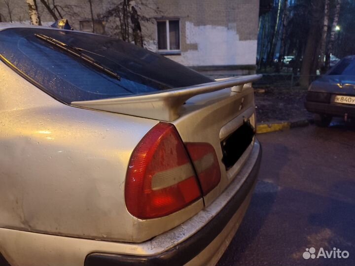 Спойлер mitsubishi carisma