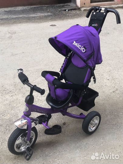 Трехколесный велосипед с ручкой