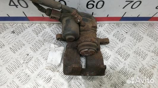 Суппорт тормозной задний левый audi A4 B8 (7NI08LS