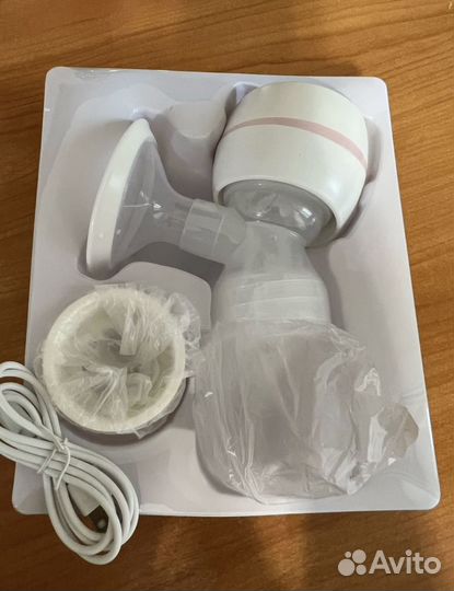 Молокоотсос электрический новый