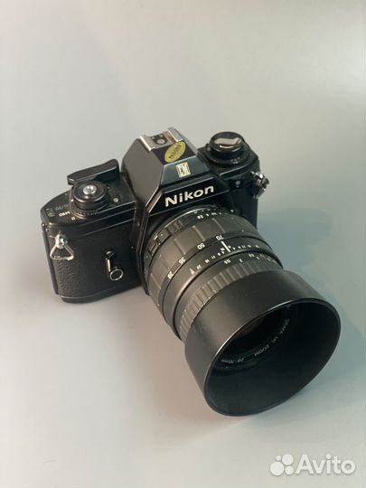 Nikon em