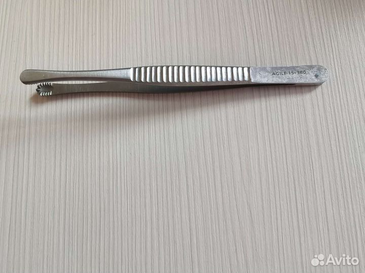 Пинцет зубчатый