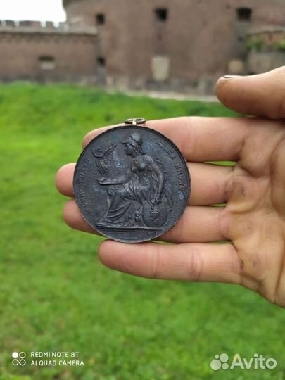 Старинная медаль
