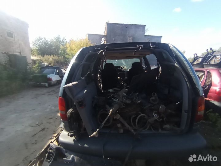 Суппорт тормозной передний Chrysler Voyager 3