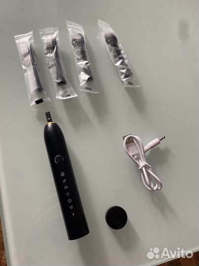 Электронная зубная щетка