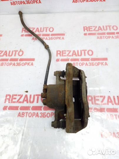 Суппорт тормозной передний правый Mitsubishi