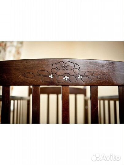 Детская кроватка с продольным маятником