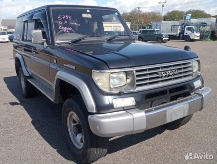 Суппорт передний левый Toyota Land Cruiser Prado