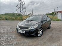 Kia Rio 1.4 AT, 2012, 145 400 км, с пробегом, цена 890 000 руб.