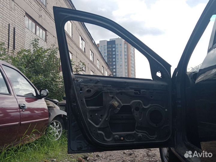 Дверь передняя левая renault logan