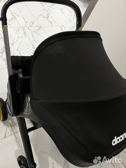 Doona Plus, nitro black с базой isofix