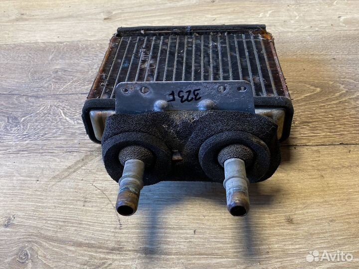 Радиатор печки mazda 323 F