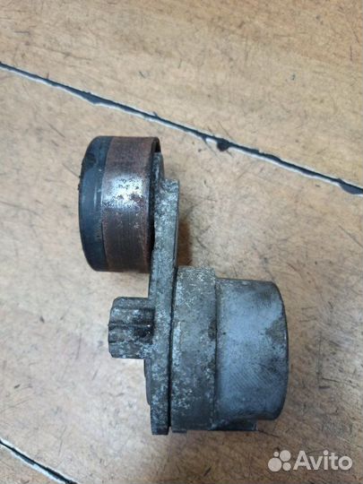 Натяжной ролик приводного ремня Opel Astra H