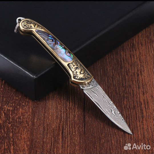 Складной нож из дамасской стали