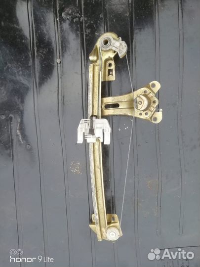 Стеклоподьемник задний левый Пежо 206