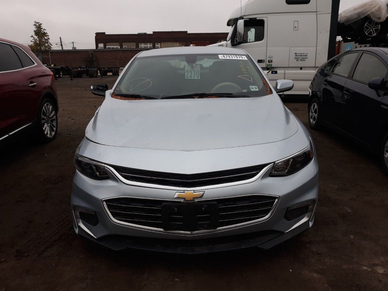 Chevrolet Malibu: фото владельца
