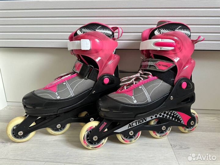 Роликовые коньки