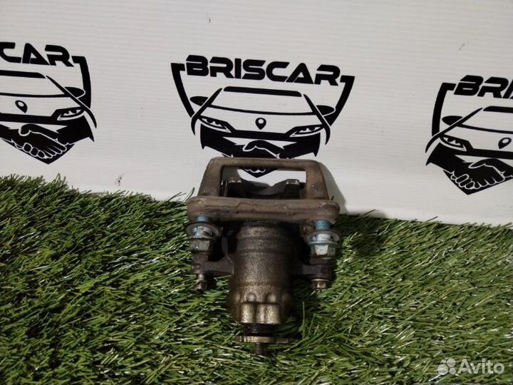 Суппорт тормозной задний левый Honda Accord CU2