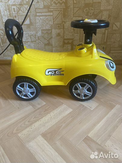 Детская машинка каталка с музыкой
