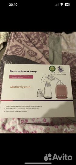 Молокоотсос электрический новый