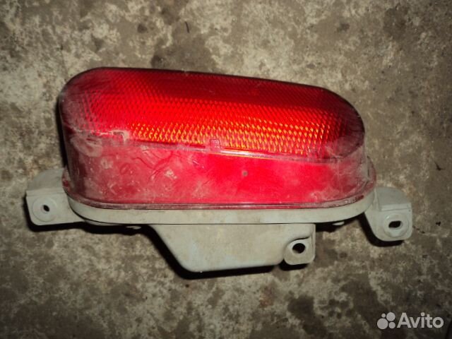 Фара противотуманная задняя Mazda