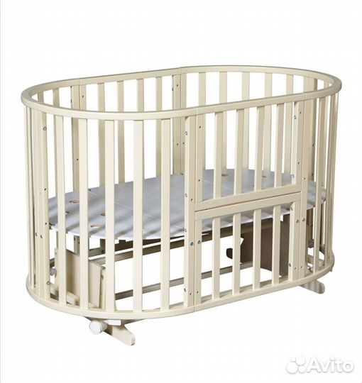 Детская кроватка с маятником круглая