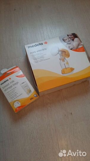 Молокоотсос medela mini electric