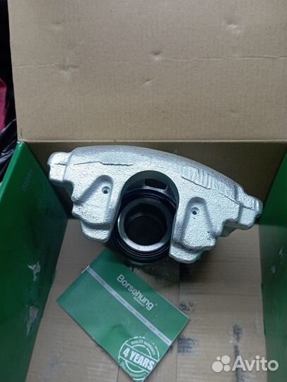 Тормозной суппорт передний левый VW, новый