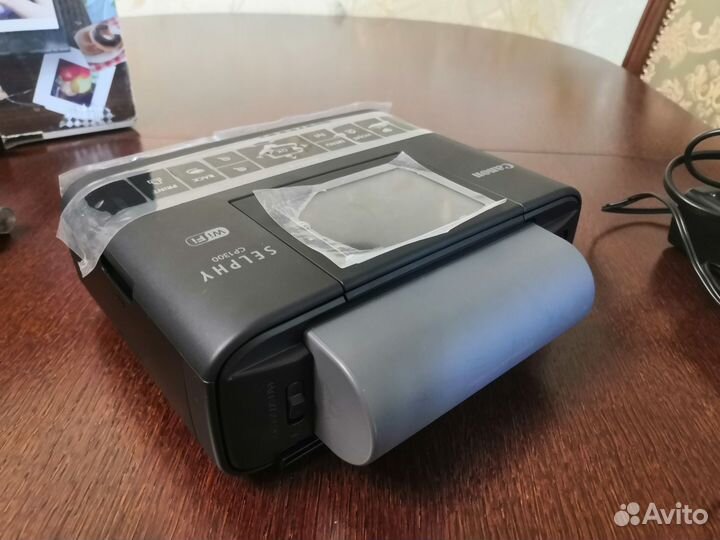 CanonSelphy CP1300+аккумулятор+комплект для печати