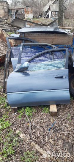 Двери на toyota corolla ae 100