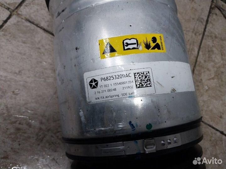 Амортизатор передний левый Jeep Grand Cherokee