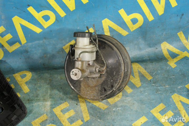 Вакуумник гтц Nissan Almera n16