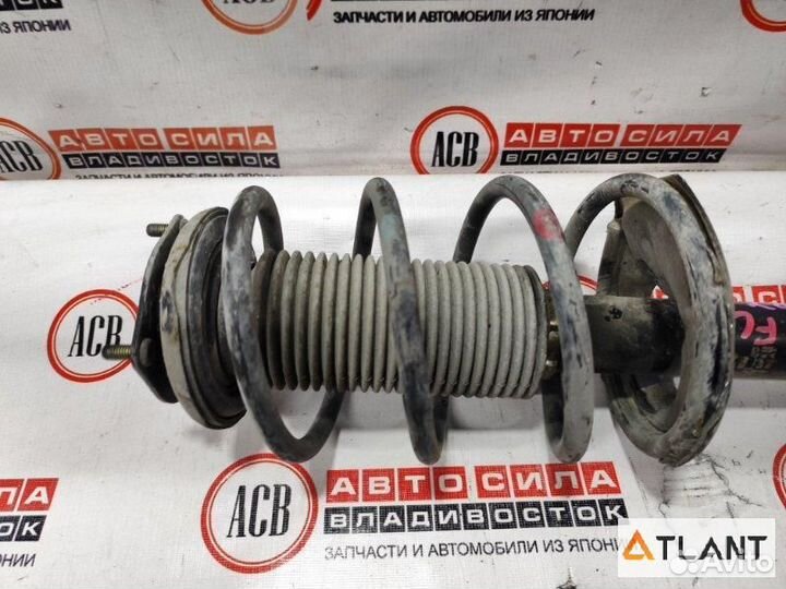 Стойка передняя левая nissan wingroad