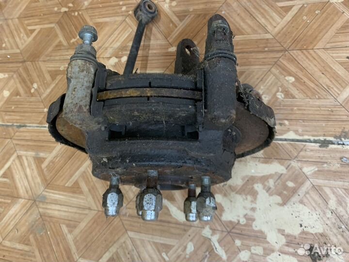 Кулак задний левый Kia Sportage 3