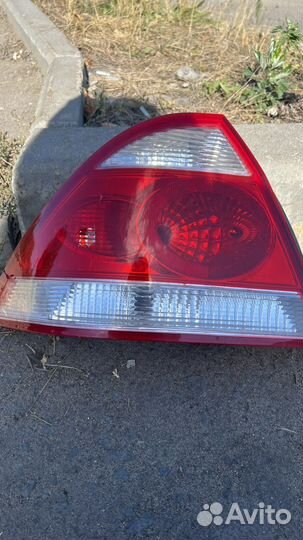 Фонарь задний nissan almera n16