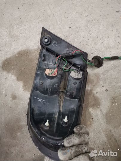 Фонарь задний левый Mazda Millenia