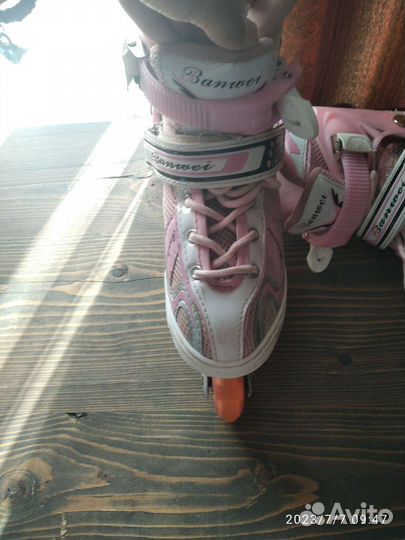 Роликовые коньки