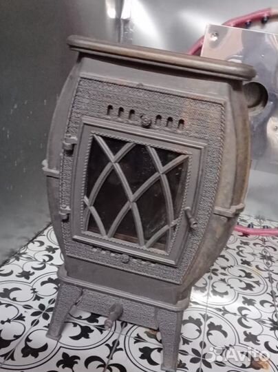 Чугунная печь камин