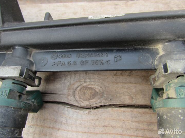 06A133317A Распределитель топлива (рампа)