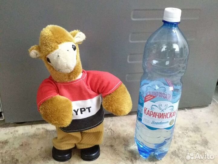 Игрушка танцует и поет