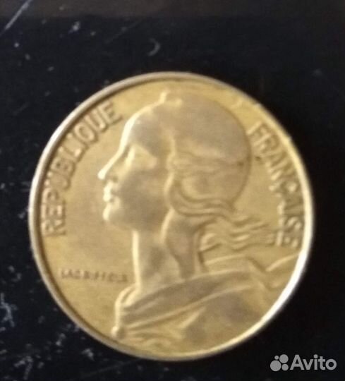 Монета 20 сантимов 1964 г