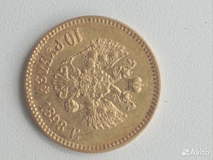 Монета золотая